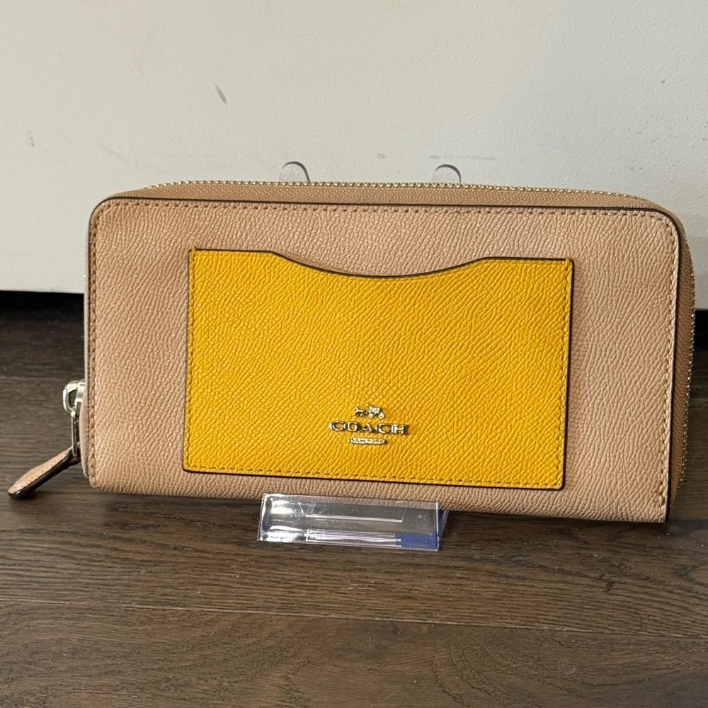Coach Beige Leather Zip Around Long Wallet with Yellow Card Pocket. EUC
